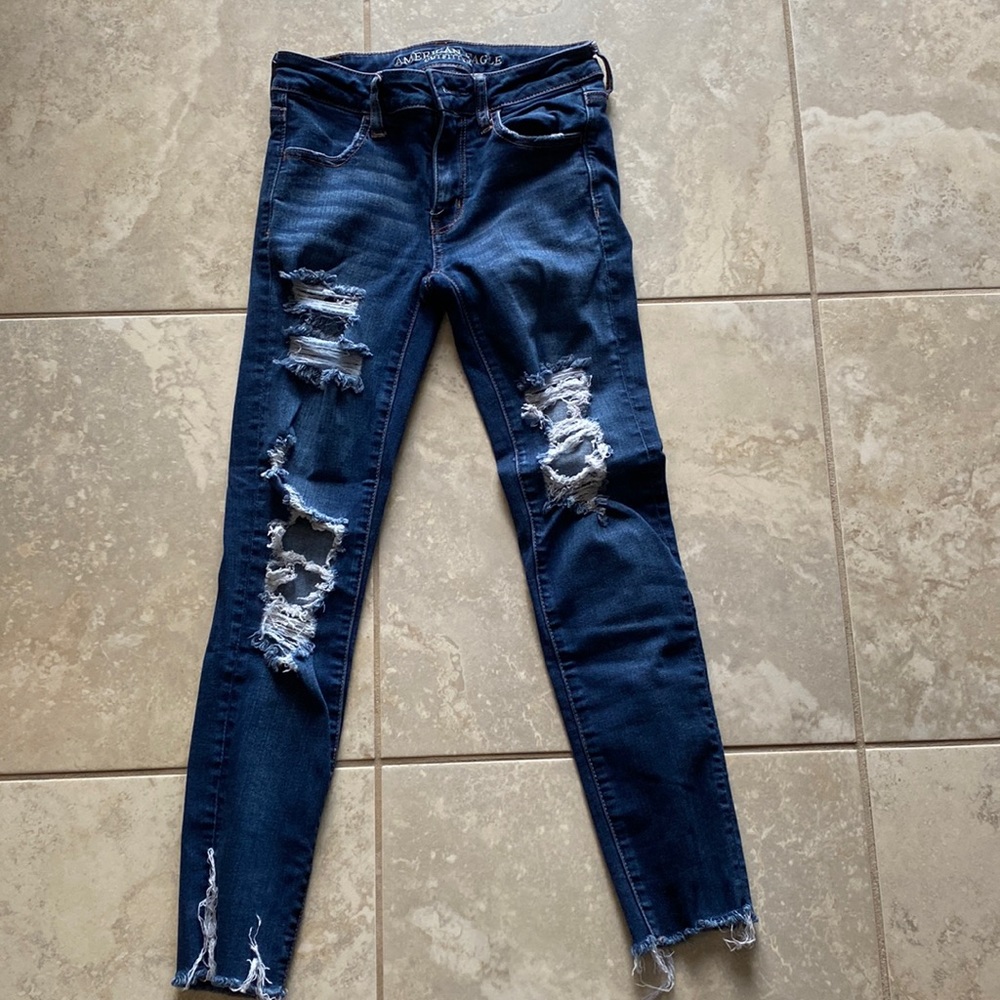 Woman’s jeans ripped style